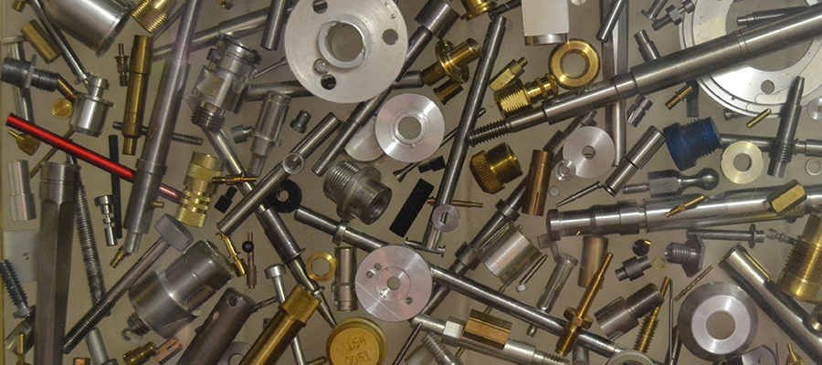 Assortment of precision-machined brass, steel and aluminium components